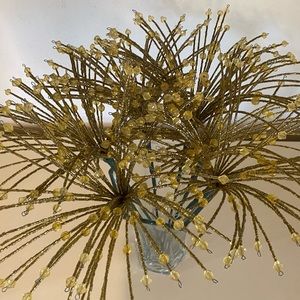 Holiday starburst ( vase not included )gold Great for home decor or tree garland